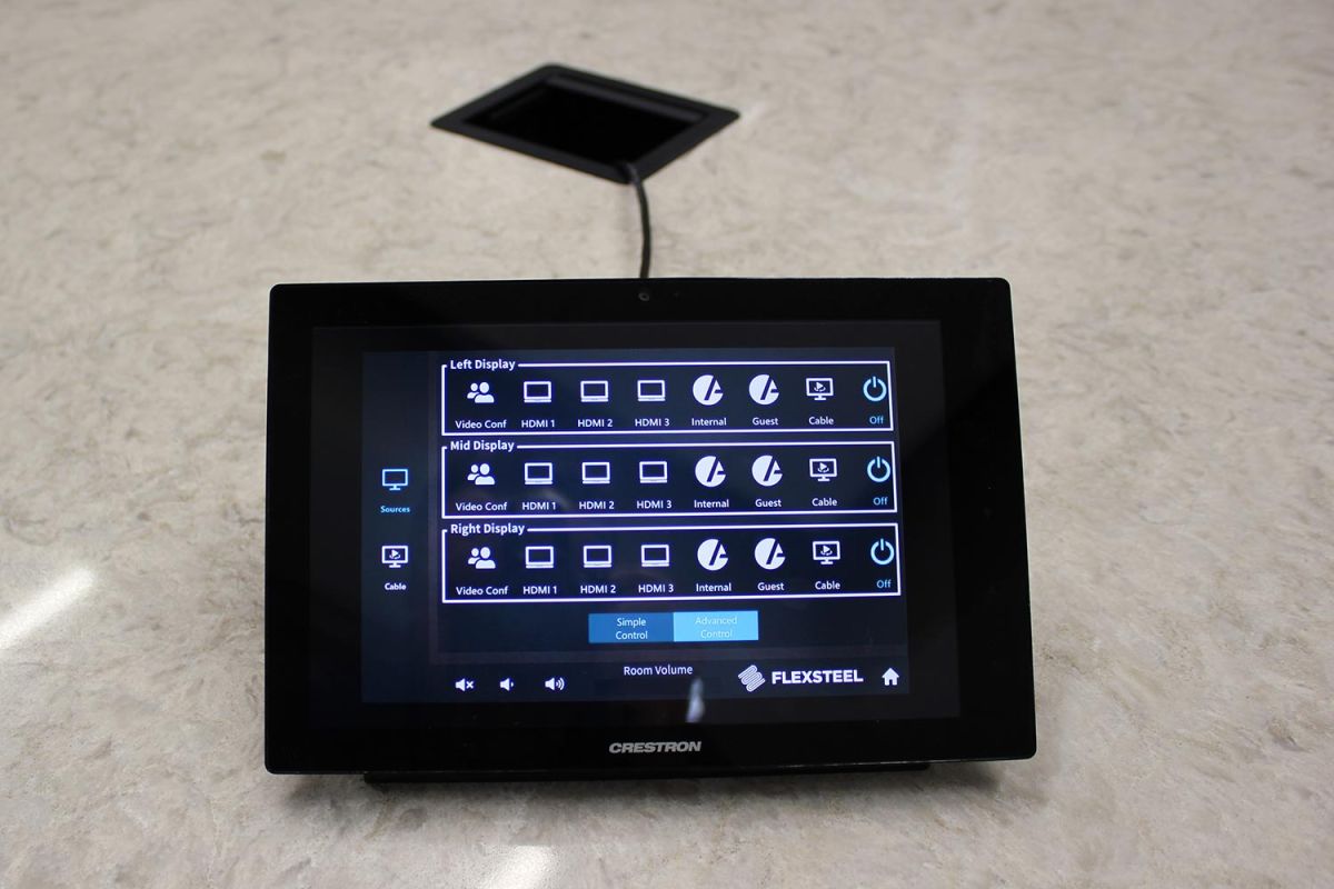 Touchscreen control panel on table for conference room AV settings