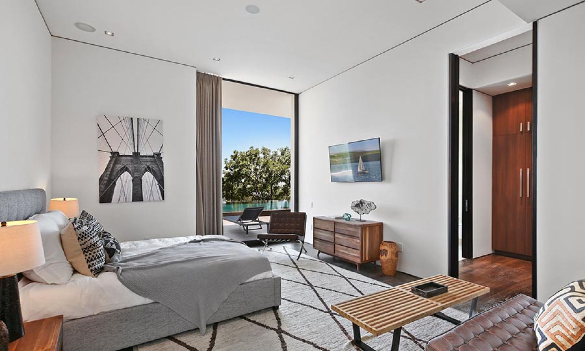 Modern bedroom with a large window view